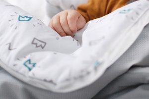 Pościel dla noworodka: Jak wybrać idealną?